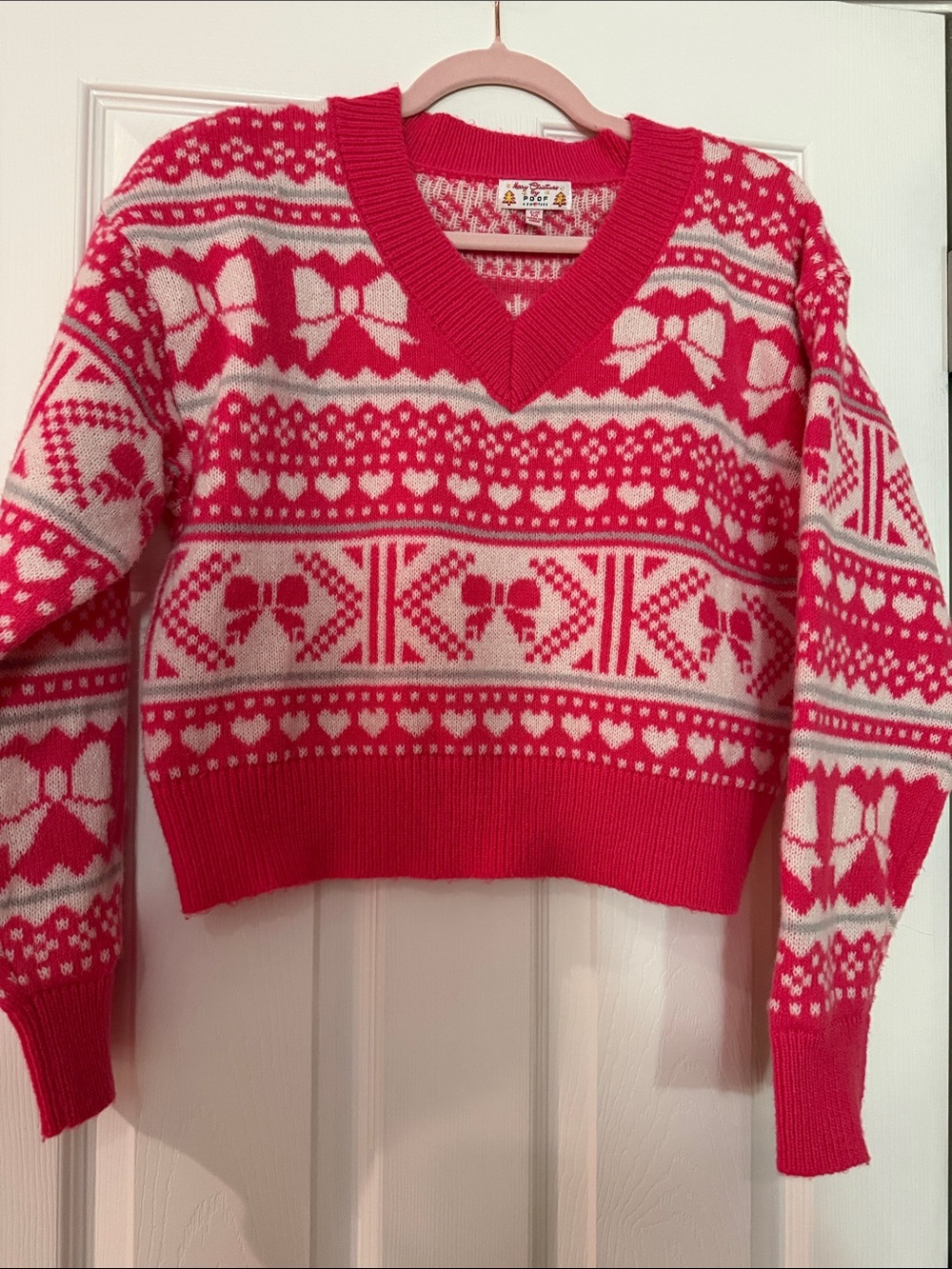 Pink and Cream Patterned V‑Neck Sweater